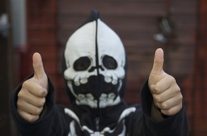 Thumbs up skeleton kid